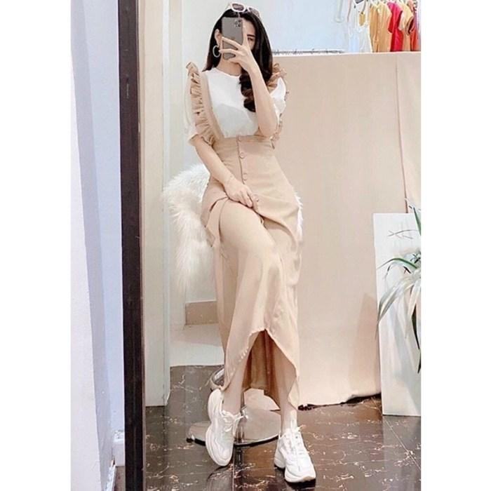 Cách tạo dáng chụp ảnh đẹp khi mặc váy yếm ngồi ghế