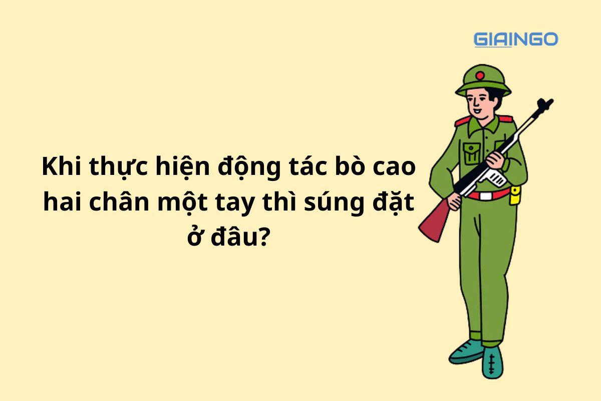 Khi thực hiện động tác bò cao hai chân một tay thì súng đặt ở đâu?